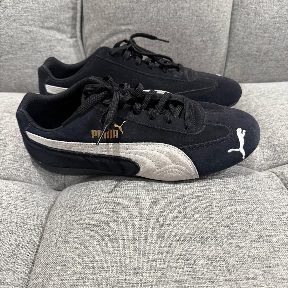 Puma Woman’s Black and White Sneakers